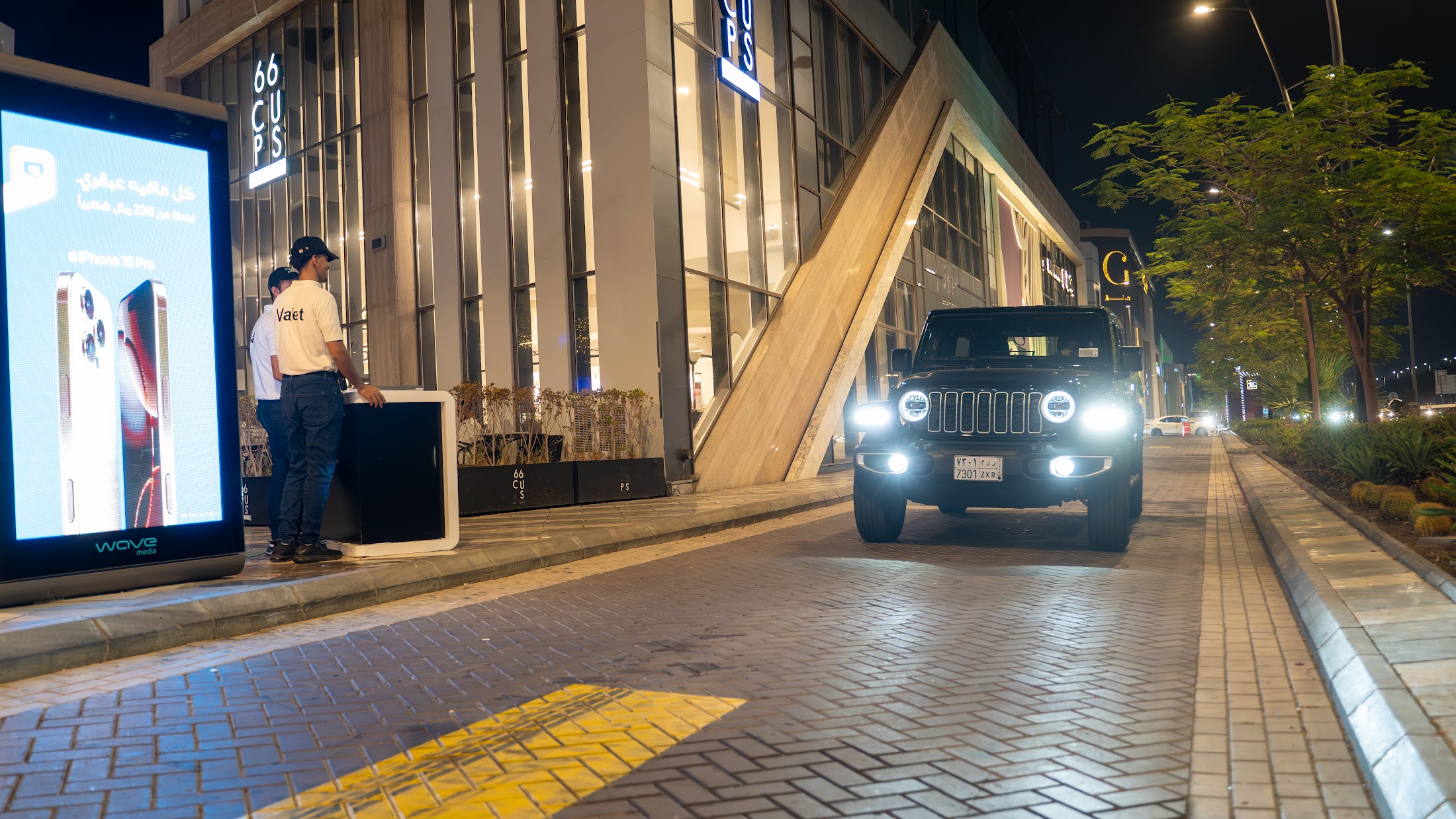 A vehicle arriving at a VPM-managed destination at night
