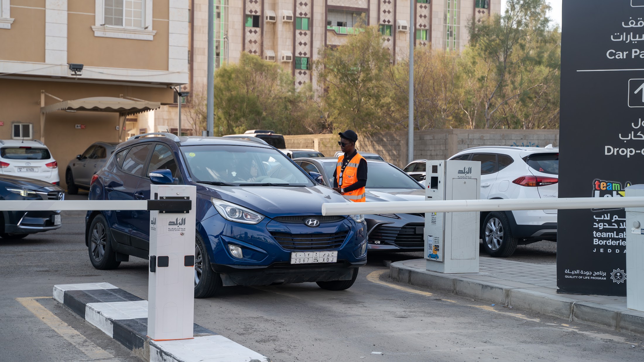 Access control barrier and ticketing lane at a managed car park